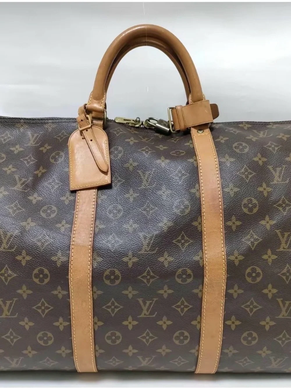 Louis Vuitton Monogram Duffel Bag in Brown and Tan Leather